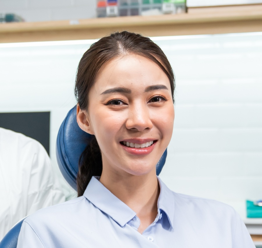 Smiling patient in dental chair at Bull Mountain Orthodontics, Tigard.